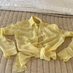Banana Republic Light Yellow Blouse tie in front of